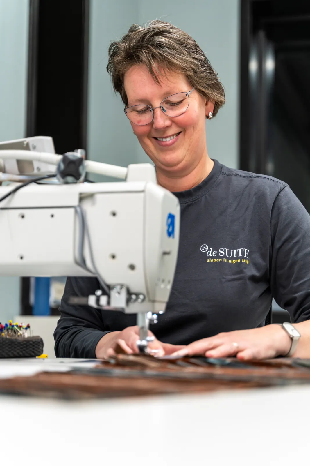 Bekleding stikken en naaien achter de machine